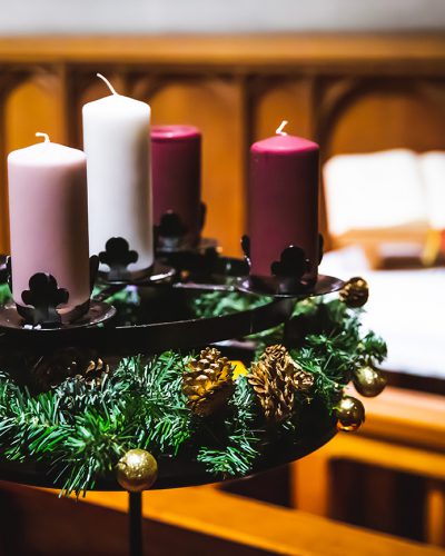 Advent decoration - candles with gradation of purple colors